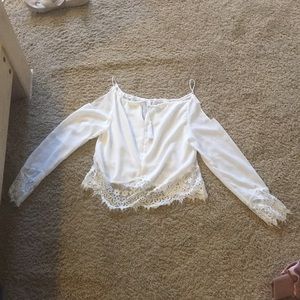 A sheer long sleeve top